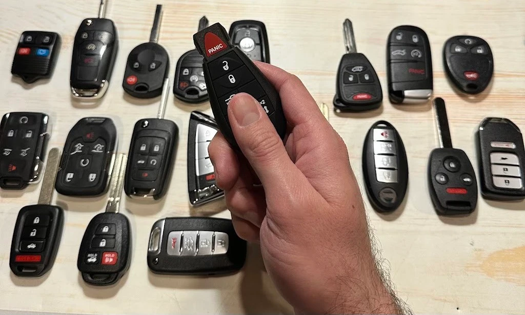 Lots of car keys and fobs